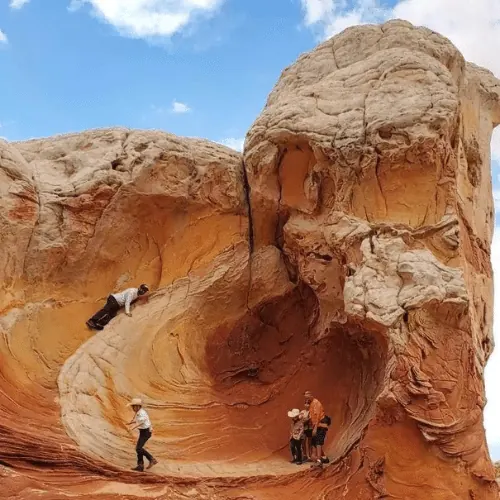 A small group exploring White Pocket